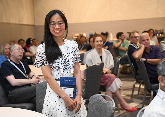 Image of AOM 2024 session with main participant in foreground