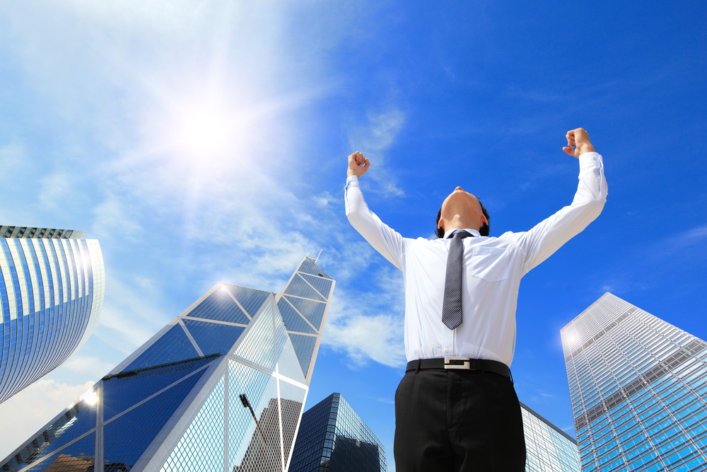 images_medium_businessman-raises-arms-in-sunshine