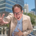 imageofbusinessmanlaughinghysterically