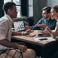 Imageoftriotalkingatwork