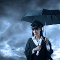 graduate-holding-umbrella-b