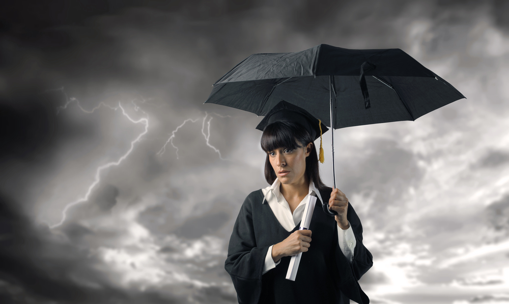 graduate-holding-umbrella